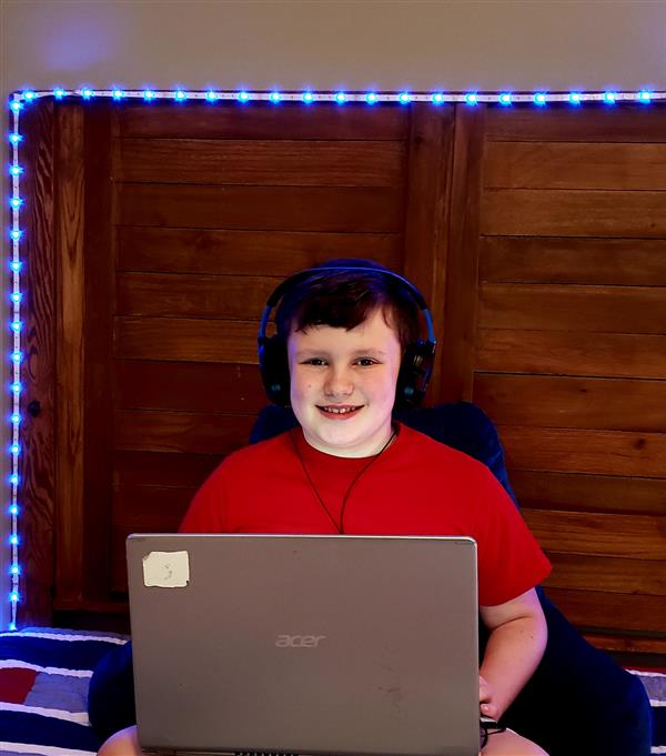 student at home on laptop